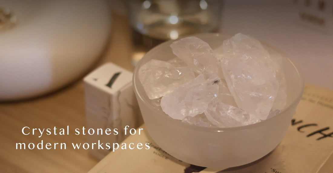 Airy crystal fragrance stones on a modern executive desk, providing a subtle personal aura of perfume-grade scent for open-plan offices and professional workspace decor.