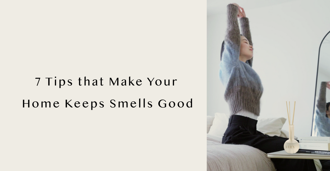 An Airy Fragrances reed diffuser in a bright, minimalist bedroom, illustrating 7 expert perfumer tips to maximize scent potential and keep a luxury home smelling good consistently.