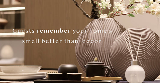 Airy Japanese reed diffuser in a minimalist Zen interior, illustrating the neuroscience of scent and the biology of home sanctuaries for high-end British wellness and interior design.