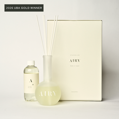 Award-winning Forest Breath 森 luxury reed diffuser set, winner of the 2026 Universal Beauty Awards Gold. The image shows the premium white gift box, frosted glass vessel, and Nagano Hinoki fragrance oil refill against a clean white background, representing the peak of Japanese artisan home fragrance.