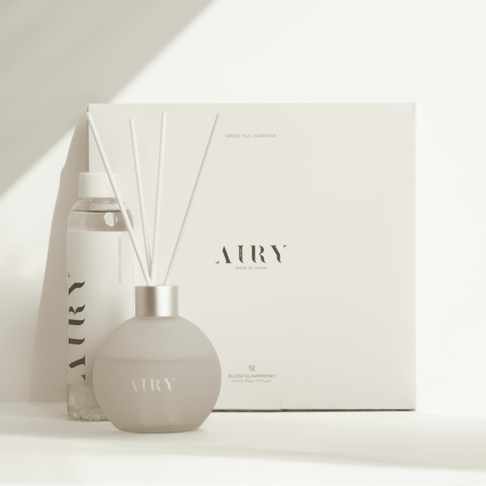 Luxury Blissful Harmony alcohol-free Japanese reed diffuser (180ml). Set includes frosted glass vessel, Kanazawa gardenia & green tea fragrance oil, and 5 premium reeds. Airy Fragrances gift packaging.